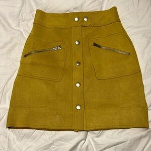 The Leo Mustard Button Front Textured Mini Skirt.